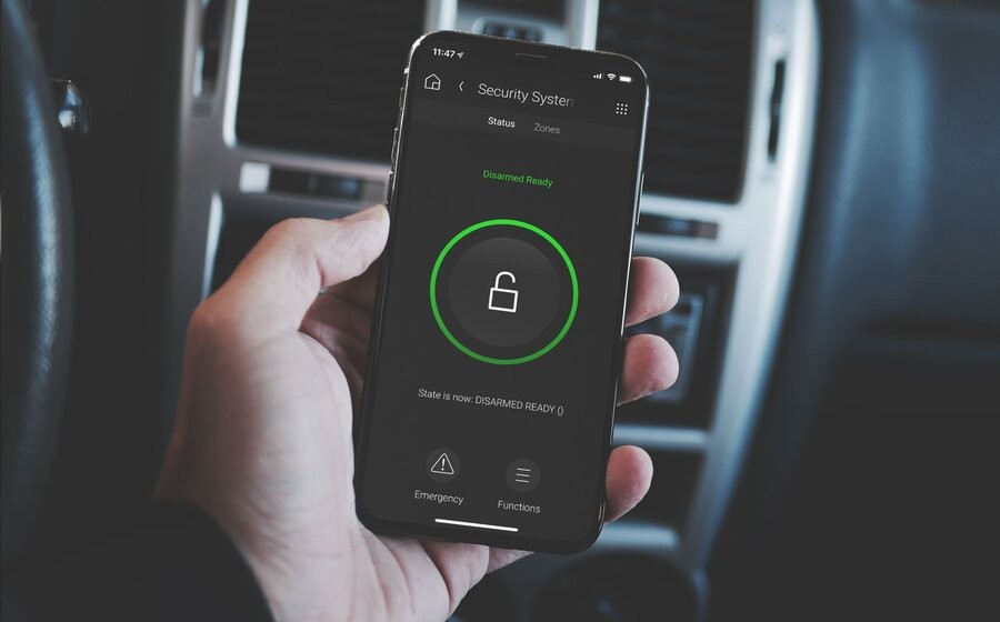 A smartphone displaying easily accessible smart home security features.