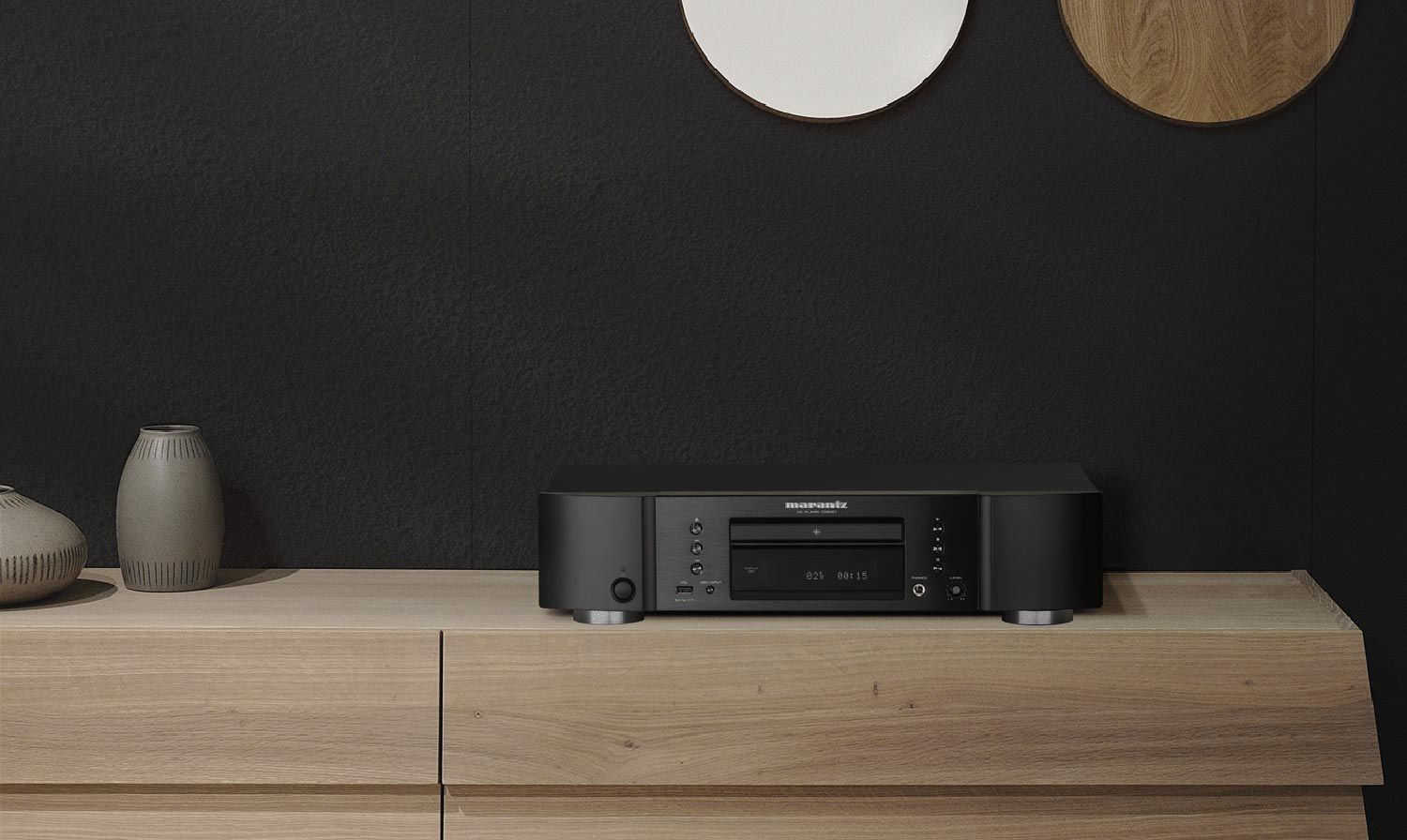 Marantz CD 6007 product on a dresser in front of grey wall