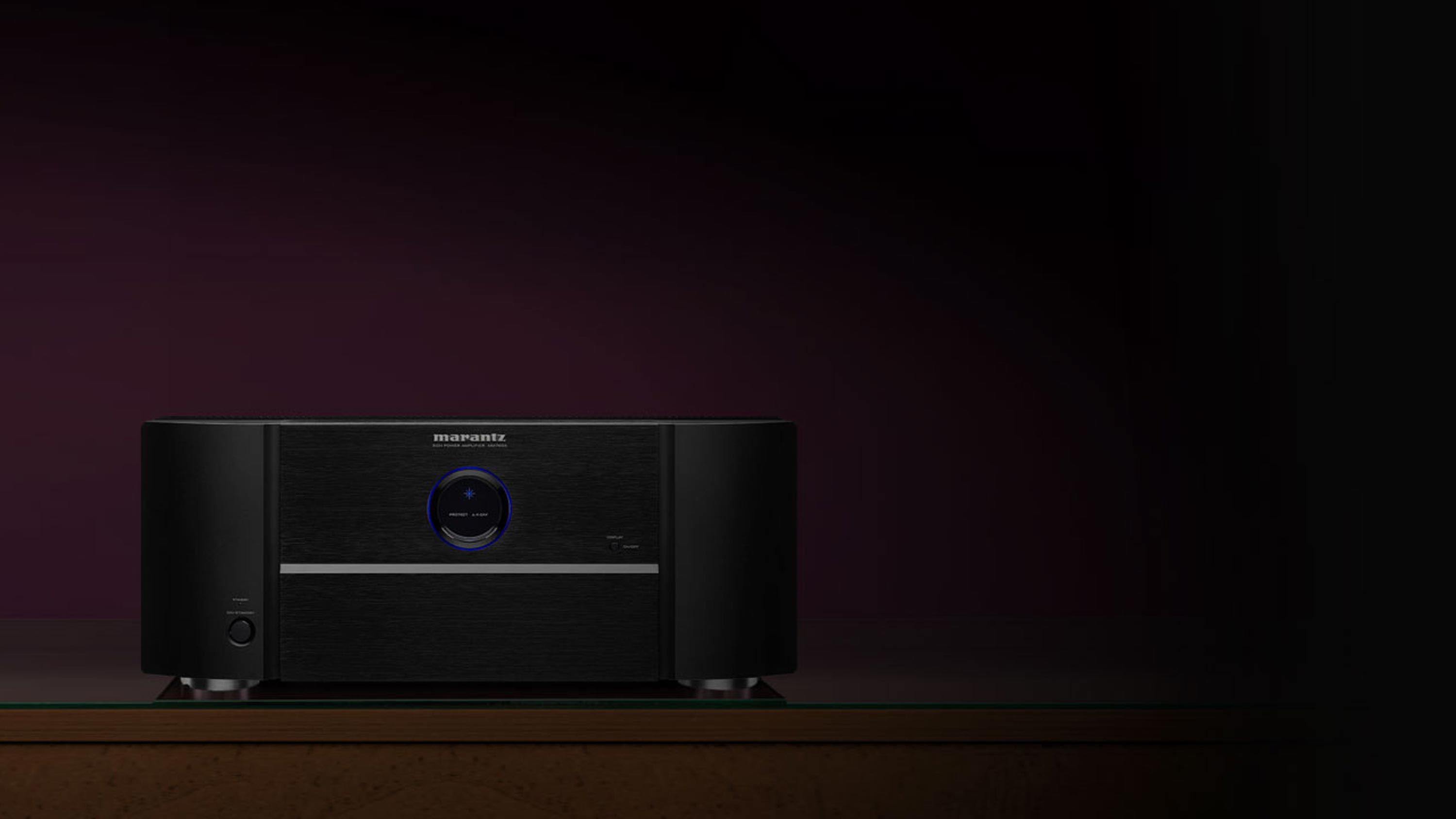 Marantz product on furniture in front of purple wall